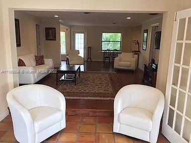 400 Southwest 14th Place Boca Raton, FL 33432 - Photo 10 of 29 a living room with furniture and wooden floor