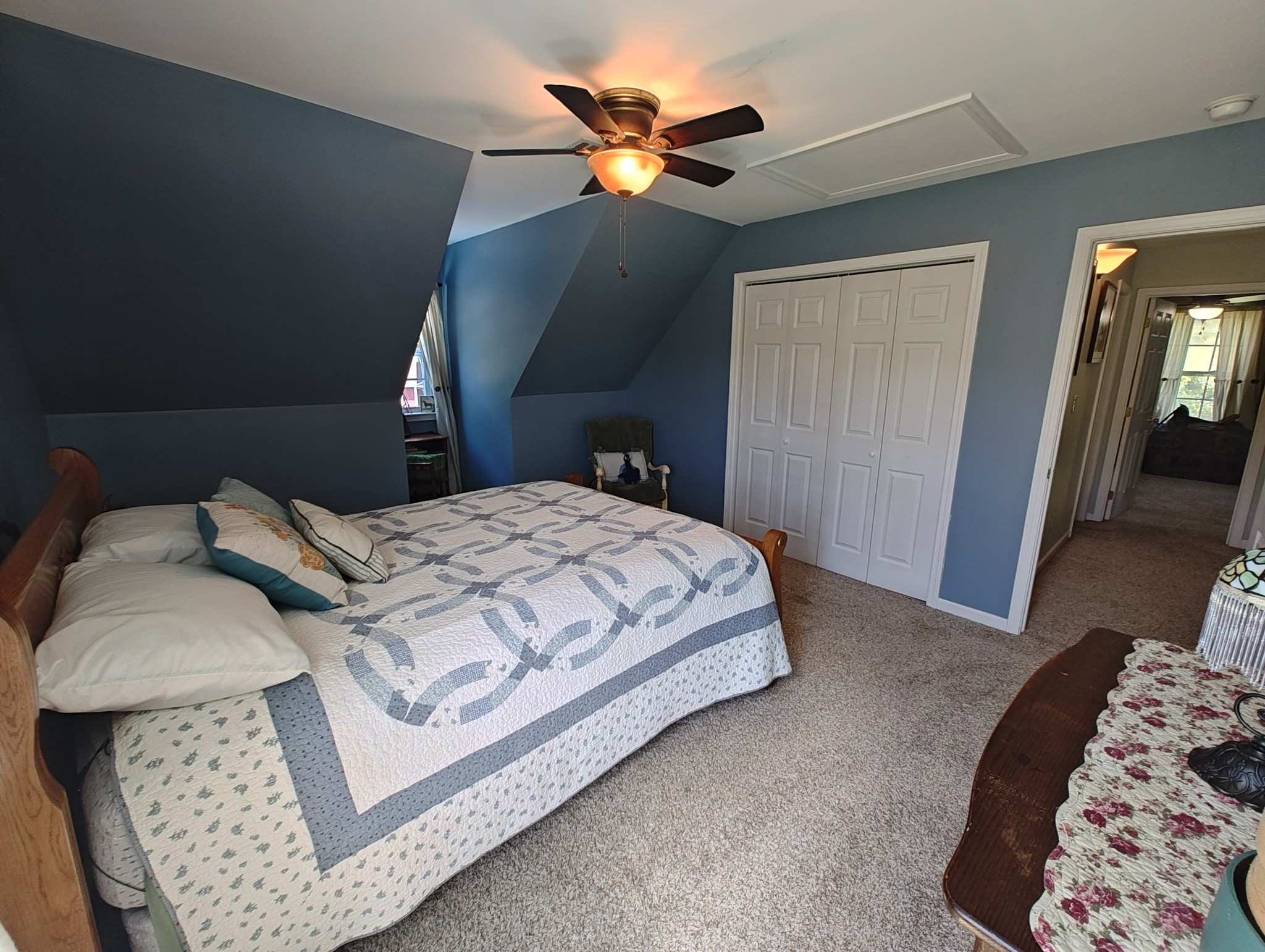 2770 Beech Log Road Watertown, TN 37184 - Photo 48 of 87 a bedroom with a bed and a chandelier