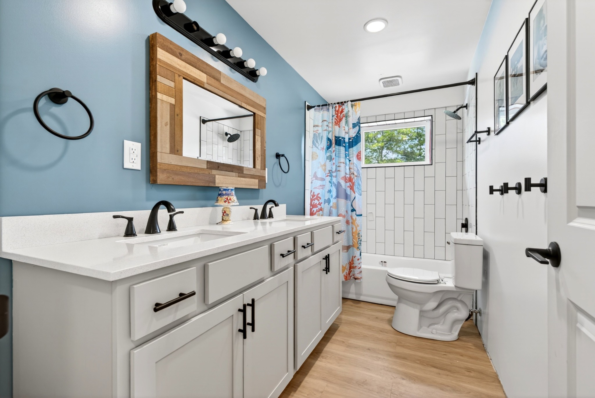 3485 Pinetree Circle Palmyra, TN 37142 - Photo 28 of 84 a bathroom with a double vanity sink mirror and toilet