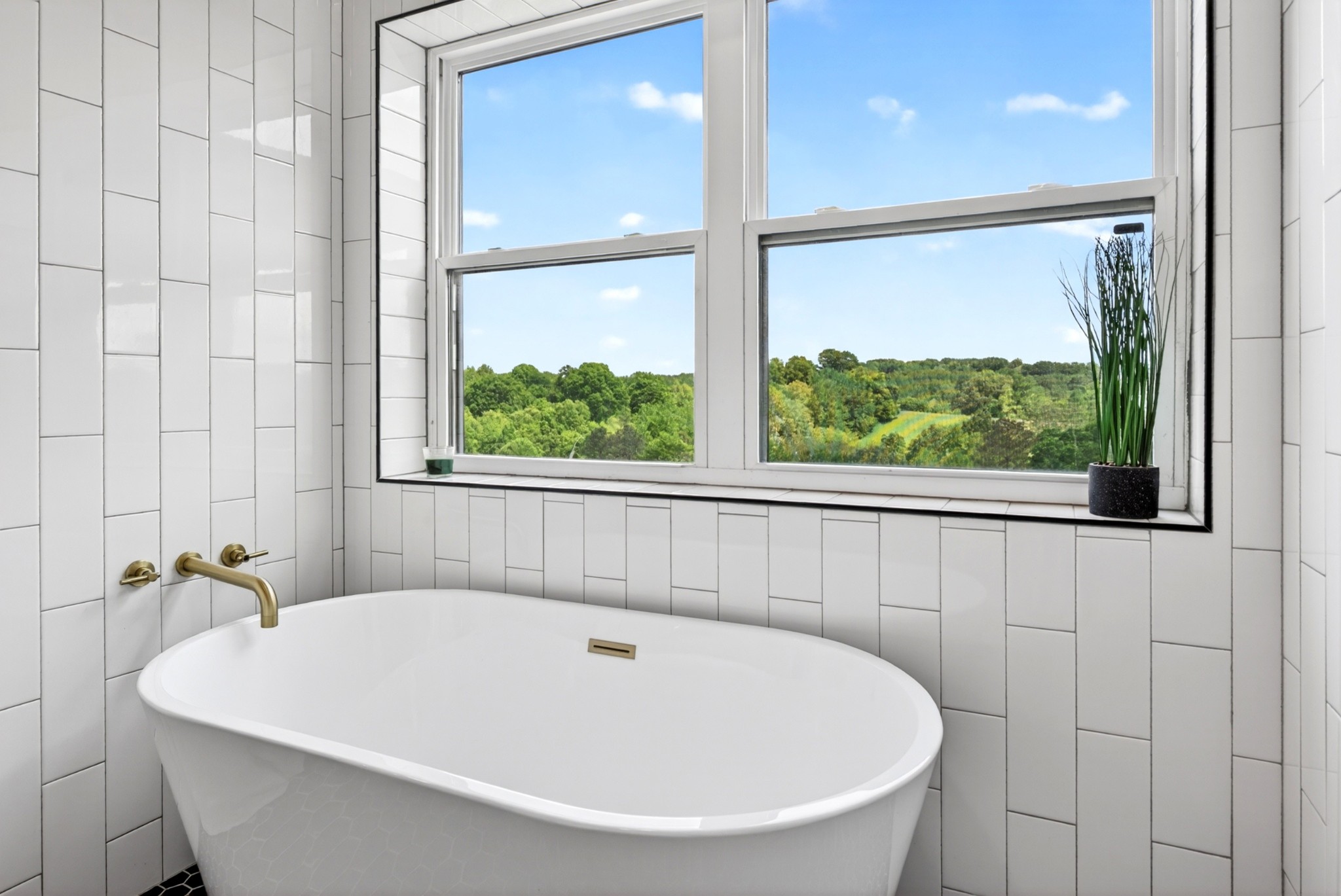 3485 Pinetree Circle Palmyra, TN 37142 - Photo 29 of 84 a white bath tub sitting next to a window
