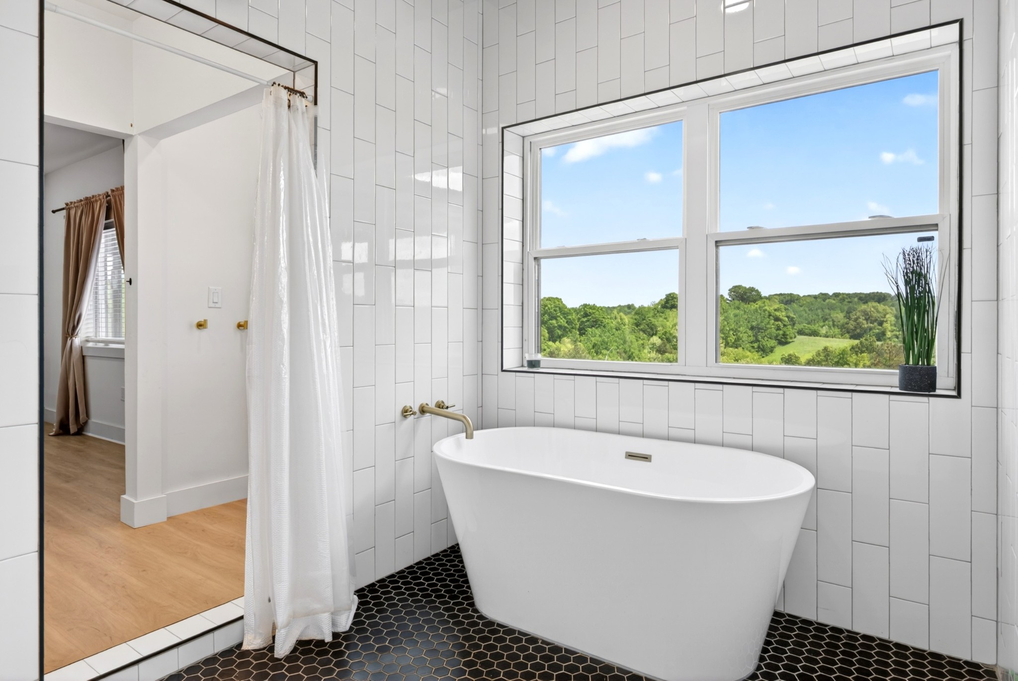 3485 Pinetree Circle Palmyra, TN 37142 - Photo 30 of 84 a white bath tub sitting next to a shower