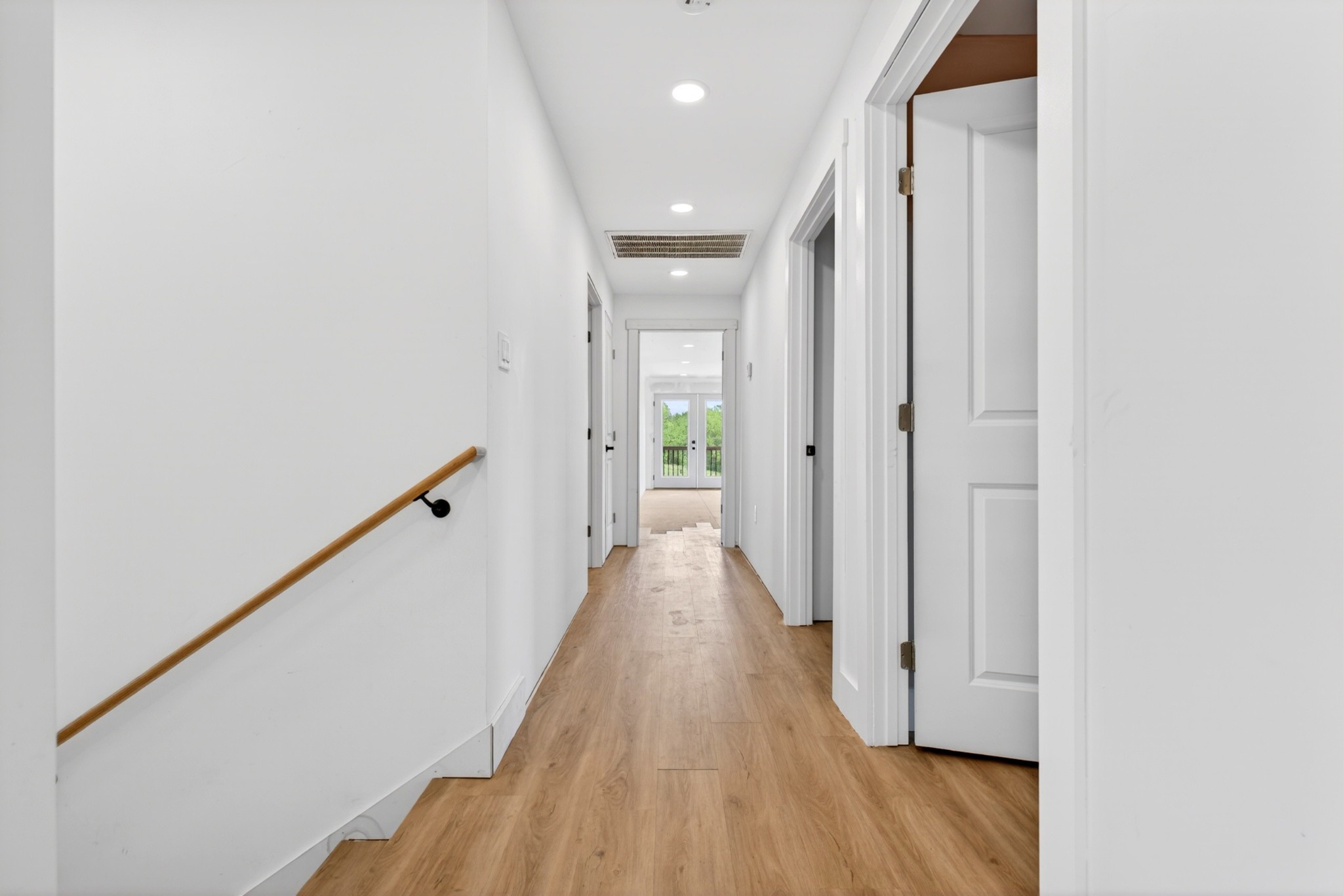 3485 Pinetree Circle Palmyra, TN 37142 - Photo 34 of 84 a view of a hallway with wooden floor