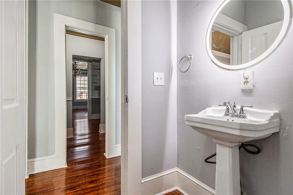 1208 North Broad Street Rome, GA 30161 - Photo 24 of 63 a bathroom with a sink and a mirror