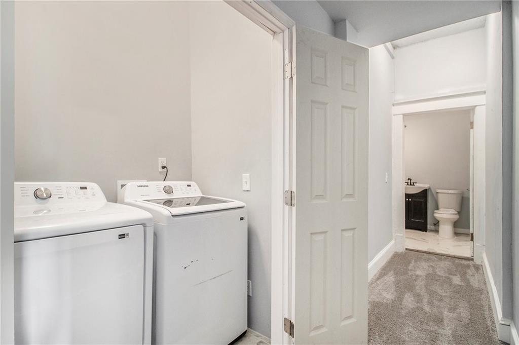1208 North Broad Street Rome, GA 30161 - Photo 29 of 63 a utility room with dryer and washer