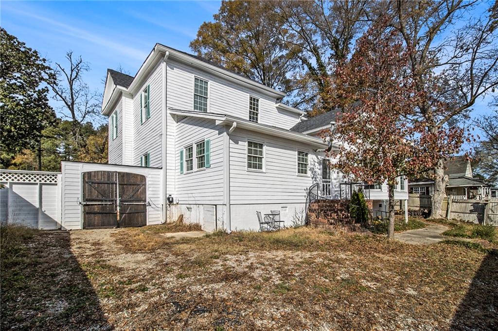 1208 North Broad Street Rome, GA 30161 - Photo 34 of 63 a front view of a house with a yard