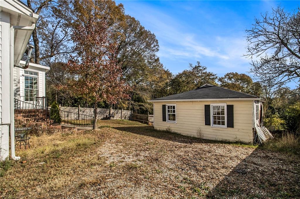 1208 North Broad Street Rome, GA 30161 - Photo 36 of 63 a view of a house with a yard