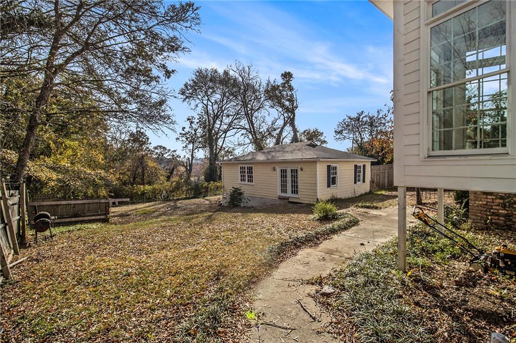 1208 North Broad Street Rome, GA 30161 - Photo 37 of 63 a view of a yard with a house and a tree
