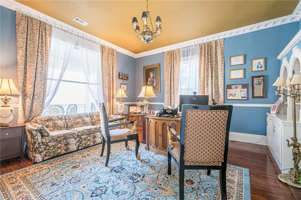 1208 North Broad Street Rome, GA 30161 - Photo 53 of 63 a living room with furniture and a large window