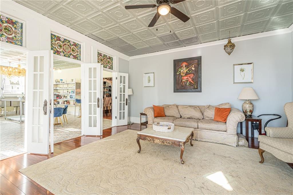 1208 North Broad Street Rome, GA 30161 - Photo 56 of 63 a living room with furniture and a flat screen tv