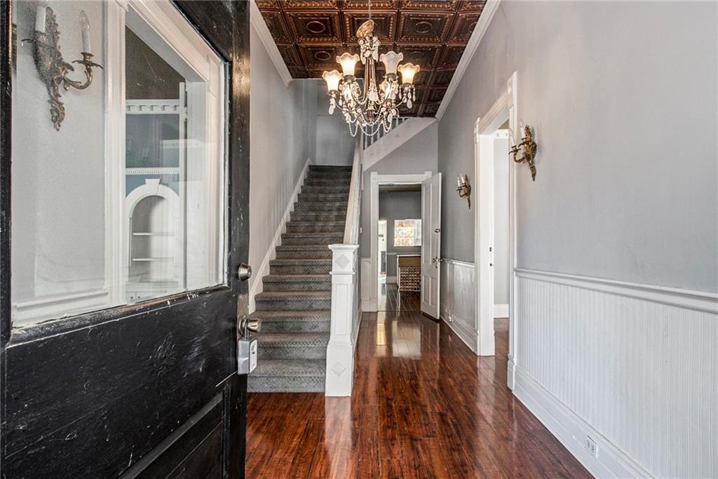 1208 North Broad Street Rome, GA 30161 - Photo 7 of 63 a view of a hallway with wooden floor and staircase