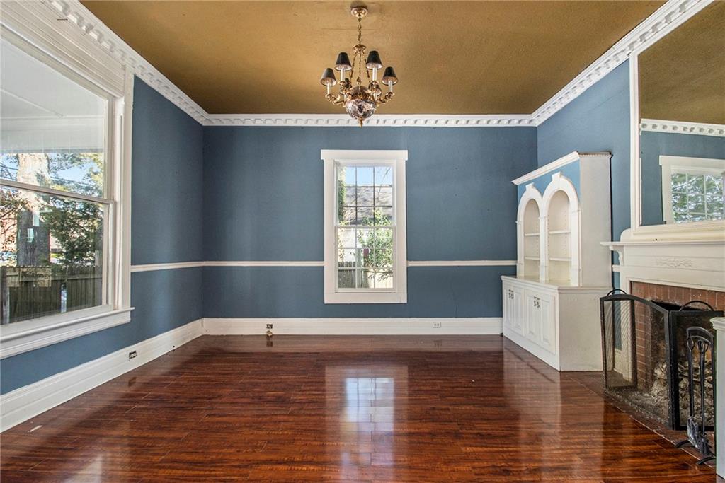 1208 North Broad Street Rome, GA 30161 - Photo 8 of 63 a view of empty room with wooden floor and fan