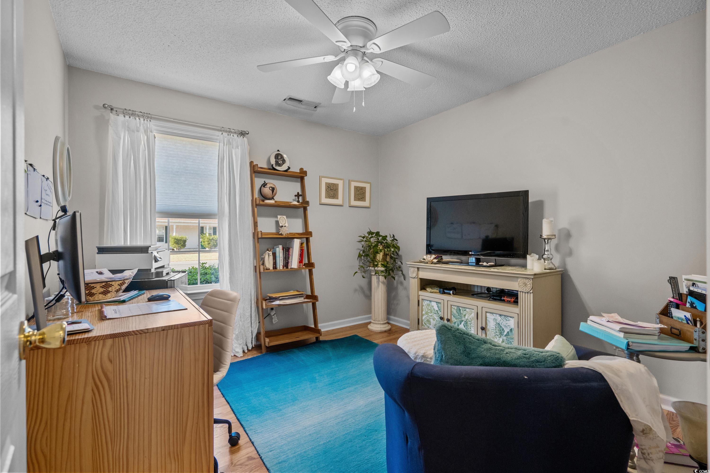 300 Kildare Court Myrtle Beach, SC 29588 - Photo 15 of 26 Office space with ceiling fan, light hardwood / wo