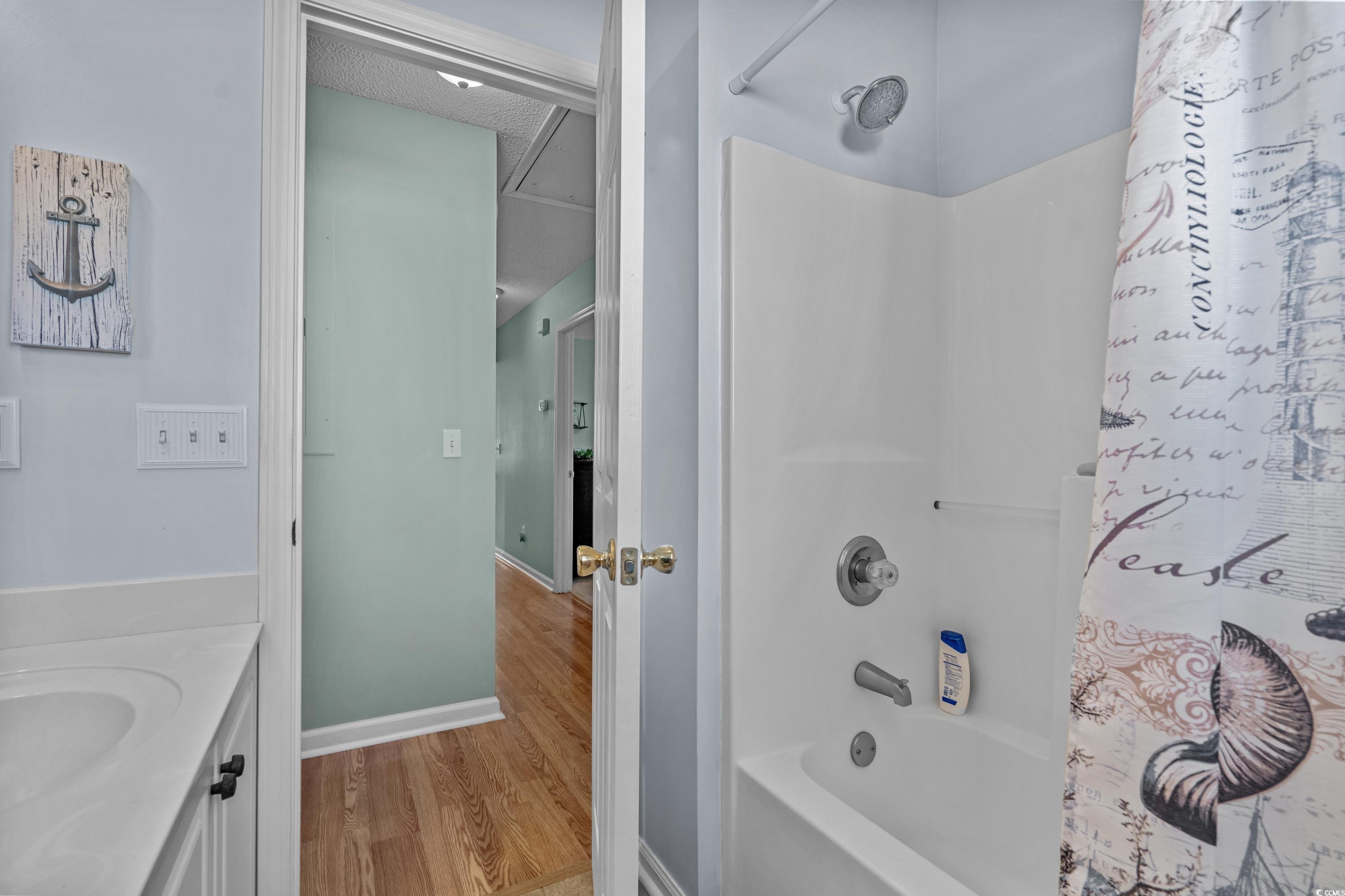 300 Kildare Court Myrtle Beach, SC 29588 - Photo 18 of 26 Bathroom with shower / bath combination with curta