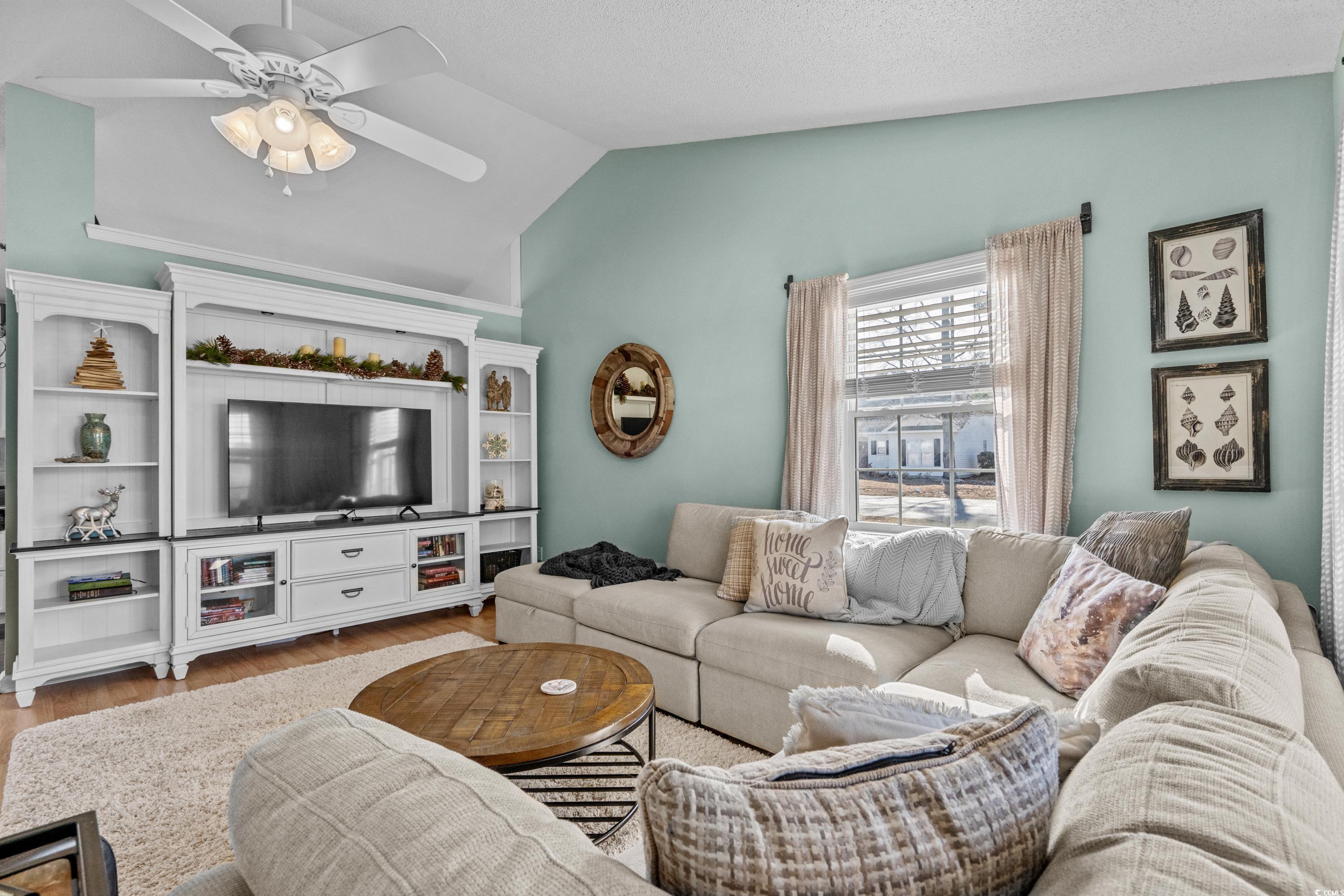 300 Kildare Court Myrtle Beach, SC 29588 - Photo 4 of 26 Living room featuring vaulted ceiling, ceiling fan