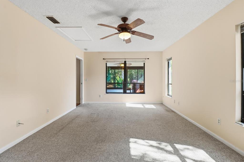 98 Sycamore Circle Homosassa, FL 34446 - Photo 17 of 34 a view of an empty room with a window