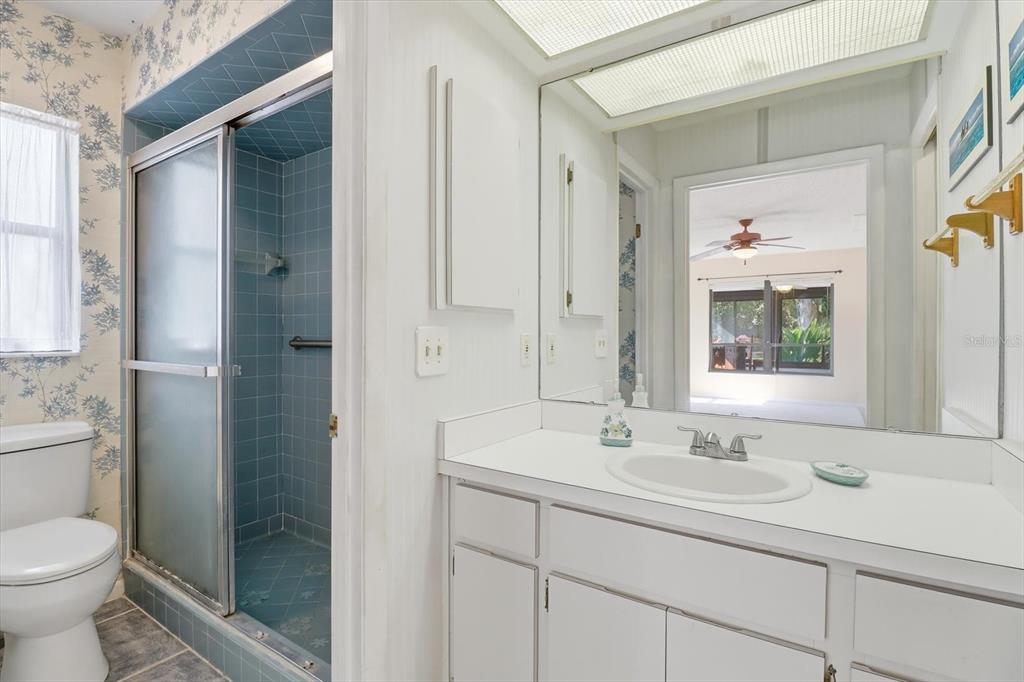 98 Sycamore Circle Homosassa, FL 34446 - Photo 18 of 34 a bathroom with a sink toilet and shower