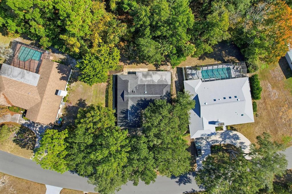 98 Sycamore Circle Homosassa, FL 34446 - Photo 30 of 34 an aerial view of a house with a yard and garden