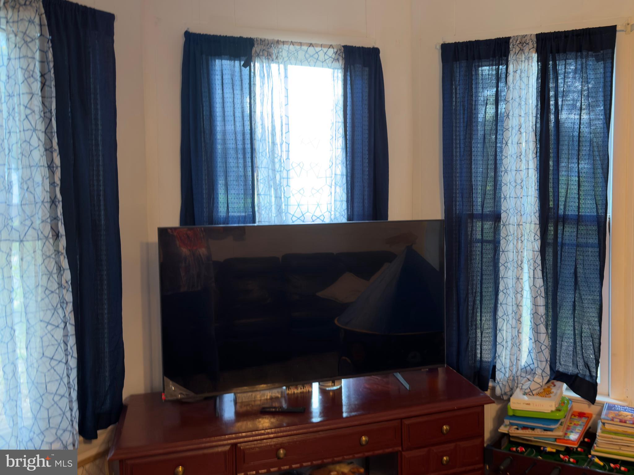 141 Hampton Street Bridgeton, NJ 08302 - Photo 3 of 18 a living room with furniture