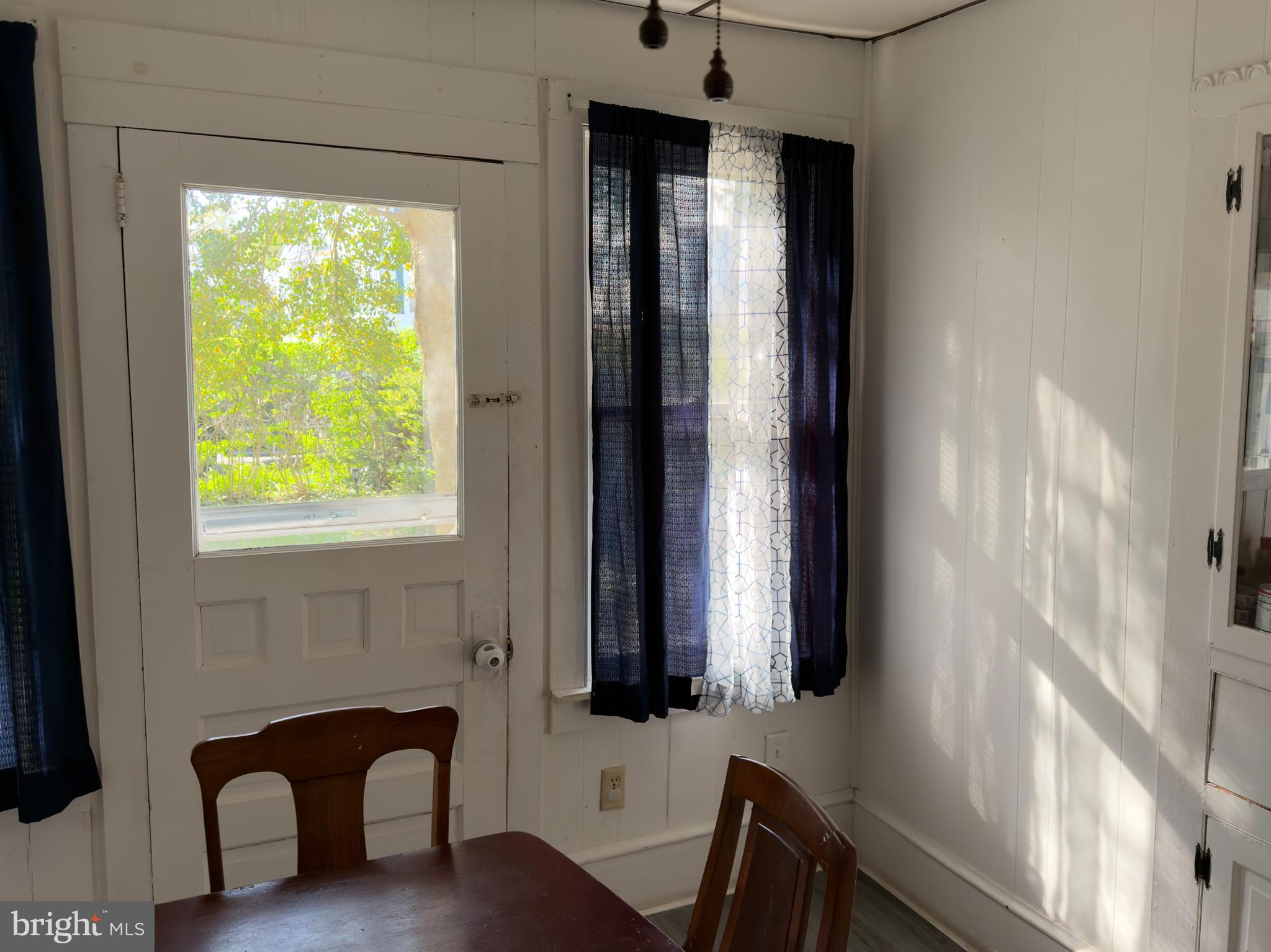 141 Hampton Street Bridgeton, NJ 08302 - Photo 8 of 18 a view of an entryway with furniture and a window