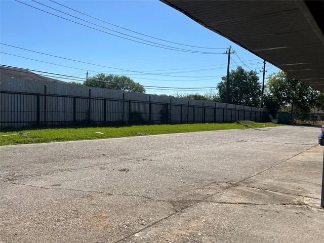 a view of a backyard with a small cabin