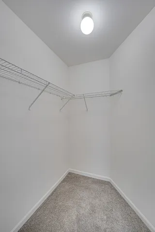 a view of a room with racks on the wall