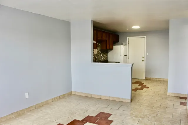 a view of a kitchen with a sink