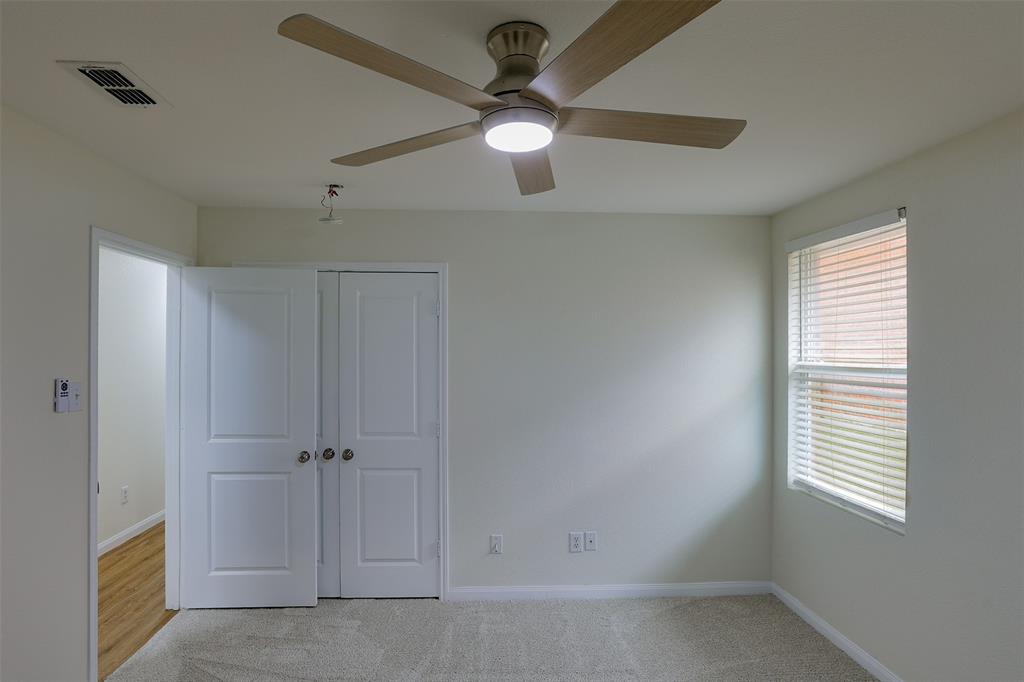 8422 Seven Hills Road Arlington, TX 76002 - Photo 22 of 28 a view of an empty room with a window