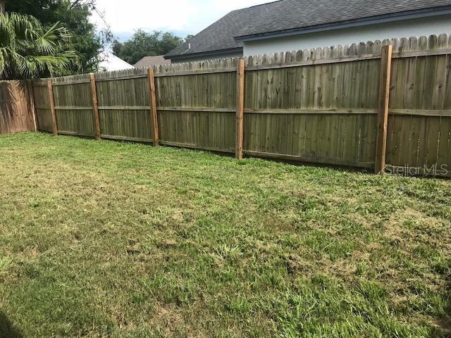 3153 Ginger Circle Orlando, FL 32826 - Photo 16 of 16 a view of a backyard