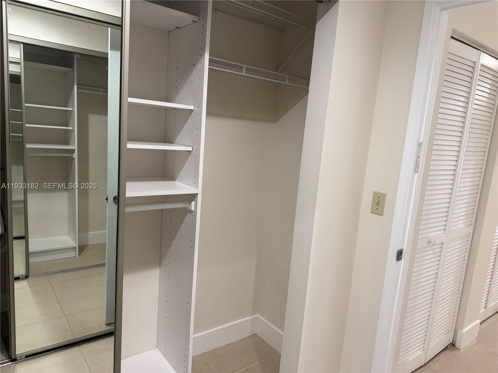 8200 Whispering Palm Drive, Unit F Boca Raton, FL 33496 - Photo 14 of 19 a view of walk in closet