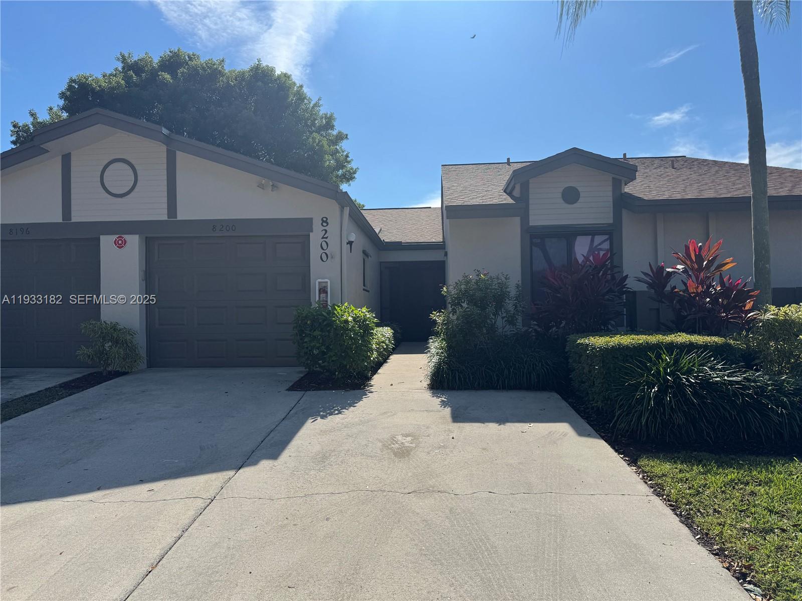8200 Whispering Palm Drive, Unit F Boca Raton, FL 33496 - Photo 17 of 19 a house view with a outdoor space