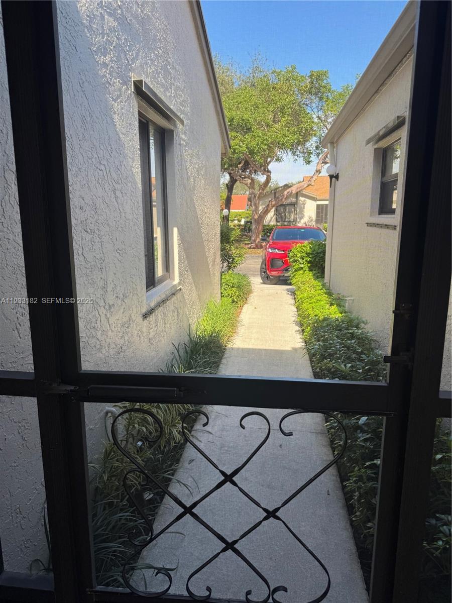 8200 Whispering Palm Drive, Unit F Boca Raton, FL 33496 - Photo 3 of 19 a bathroom with a sink and a mirror