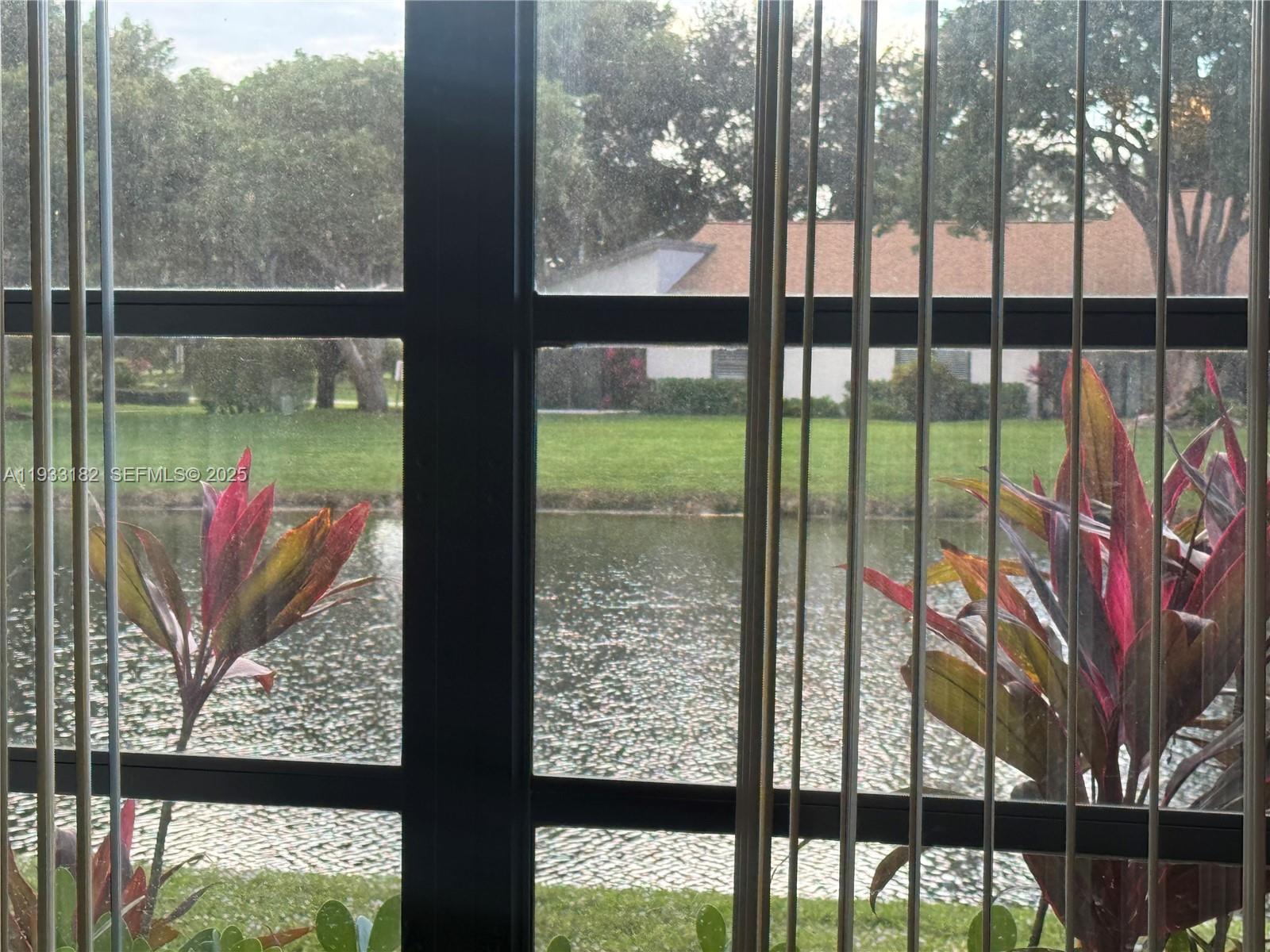 8200 Whispering Palm Drive, Unit F Boca Raton, FL 33496 - Photo 7 of 19 a view of a from a balcony