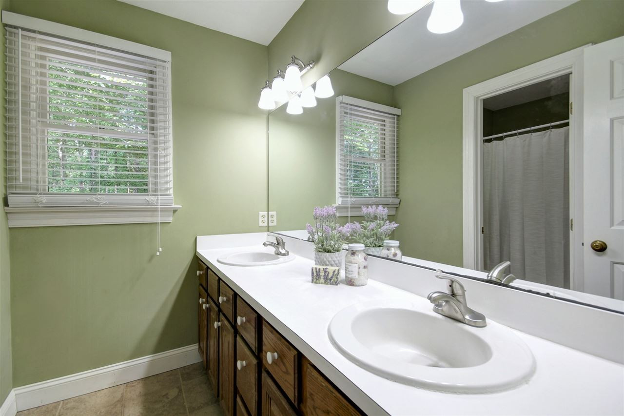 7228 Rabbit Run Wake Forest, NC 27587 - Photo 16 of 25 Guest Bath with dual sinks