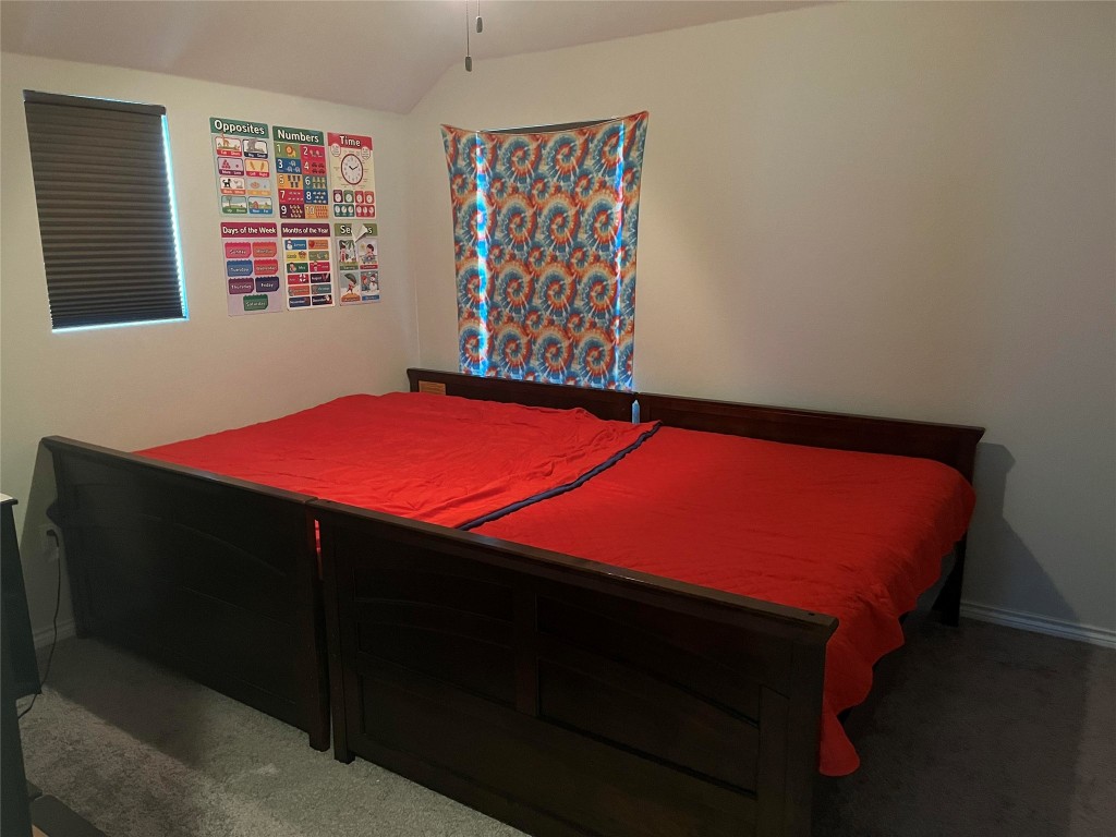 14104 McCoy Loop, Unit 3 Austin, TX 78717 - Photo 12 of 19 a room with a bed and a window