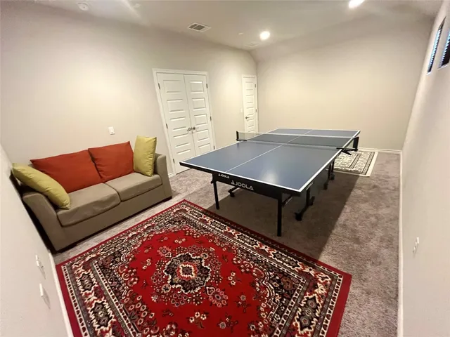 a living room with a couch and a coffee table