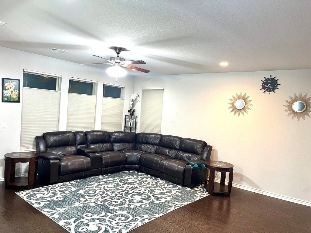 14104 McCoy Loop, Unit 3 Austin, TX 78717 - Photo 2 of 19 a living room with furniture and a rug