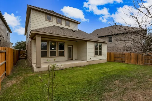 a view of a house with a garden