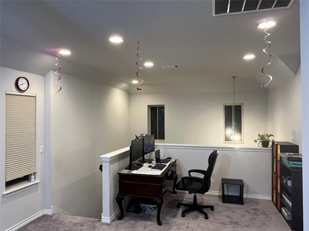 14104 McCoy Loop, Unit 3 Austin, TX 78717 - Photo 9 of 19 a view of a workspace with furniture