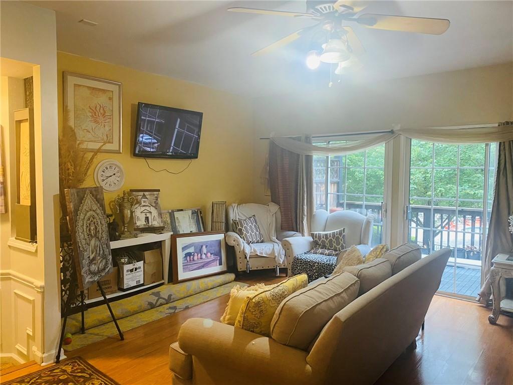 3914 Howell Park Road Duluth, GA 30096 - Photo 5 of 33 a bedroom with furniture and a large window