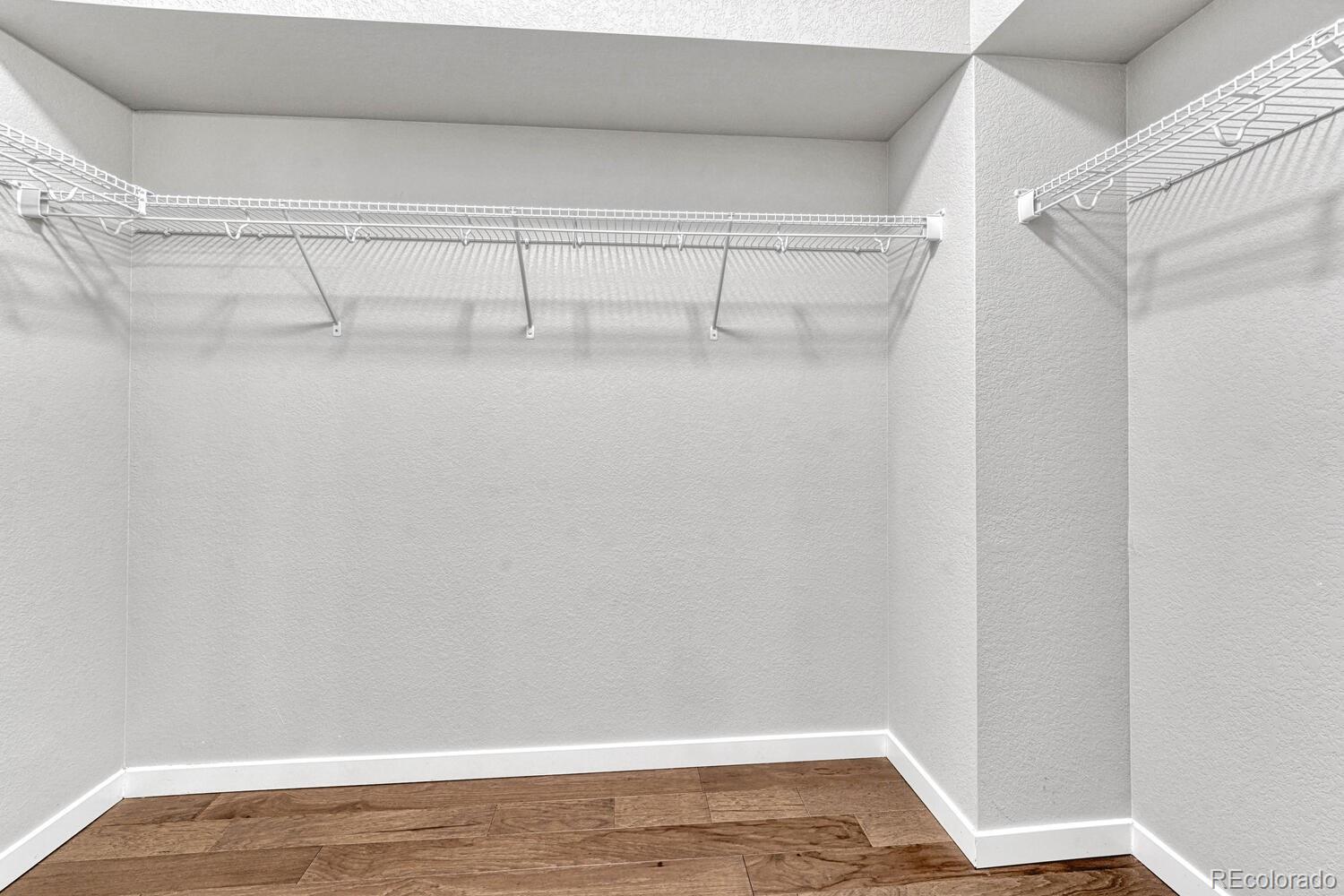 8338 Rivulet Point Highlands Ranch, CO 80129 - Photo 30 of 46 a view of a room with racks on the wall