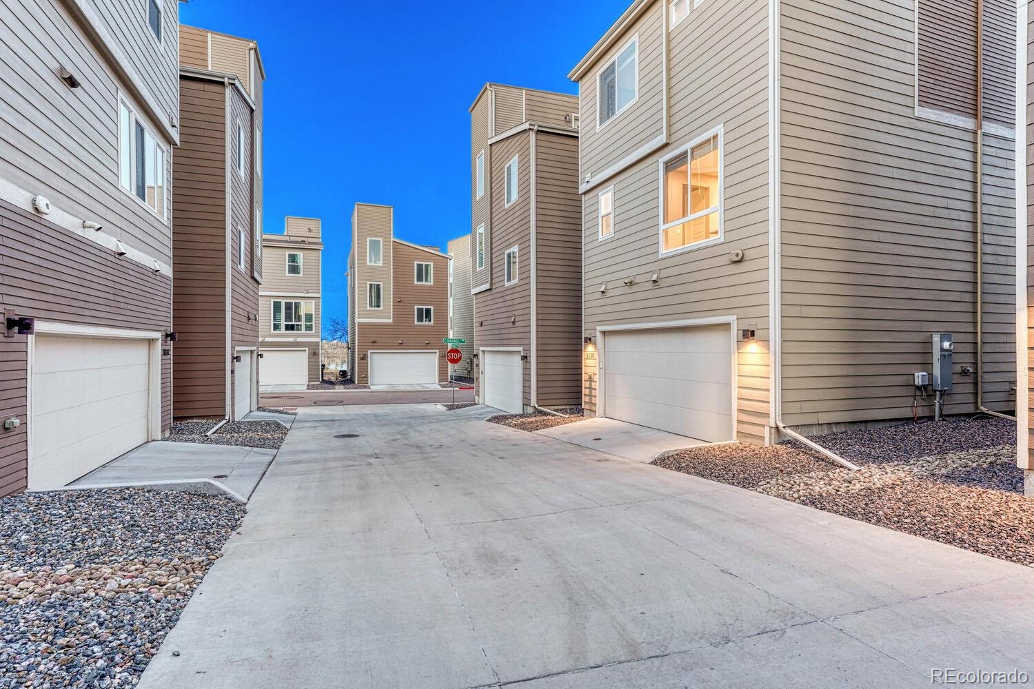 8338 Rivulet Point Highlands Ranch, CO 80129 - Photo 41 of 46 a view of a house with a road