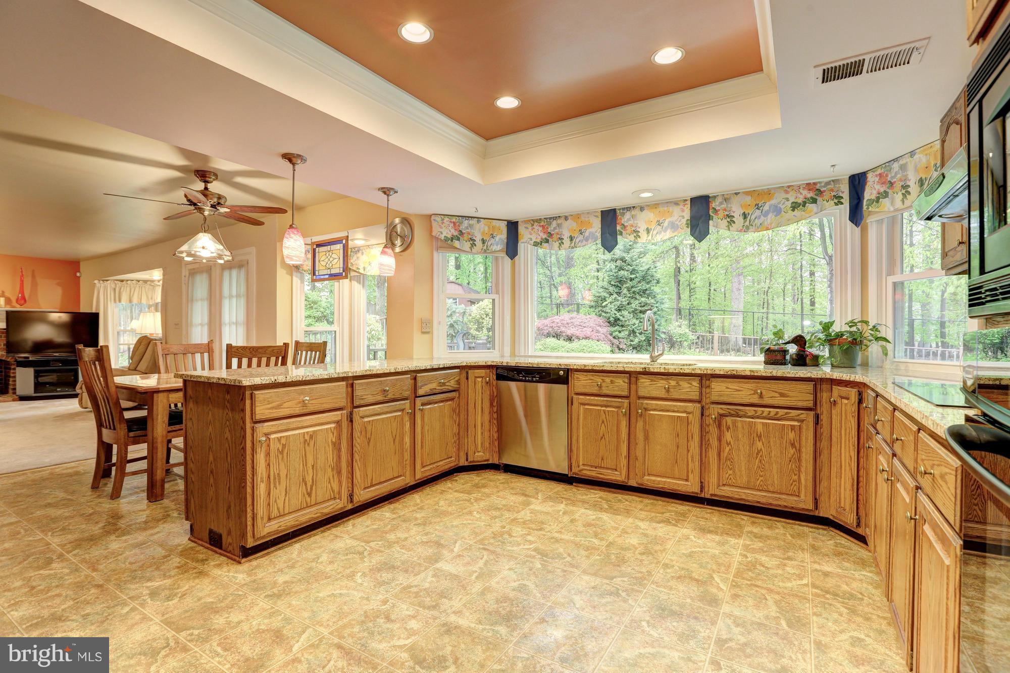 13408 Rippling Brook Drive Silver Spring, MD 20906 - Photo 13 of 30 Tablespace Kitchen withSweeping View Backyard