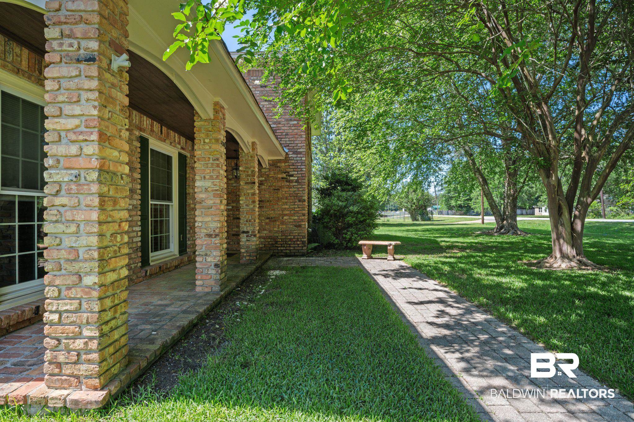 950 Walter Smith Road Mobile, AL 36695 - Photo 6 of 51 View of green lawn