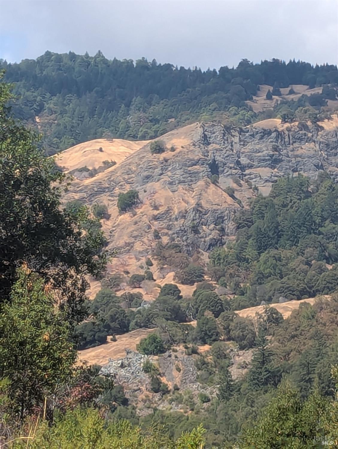 59202 George Washington Rock Road Laytonville, CA 95454 - Photo 12 of 34 an aerial view of mountain with trees all around