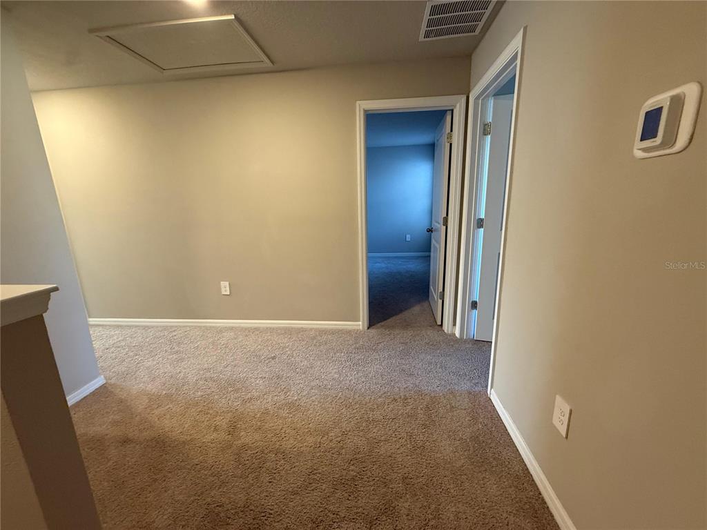 7649 Intrepid Road Wesley Chapel, FL 33545 - Photo 19 of 46 a view of an empty room