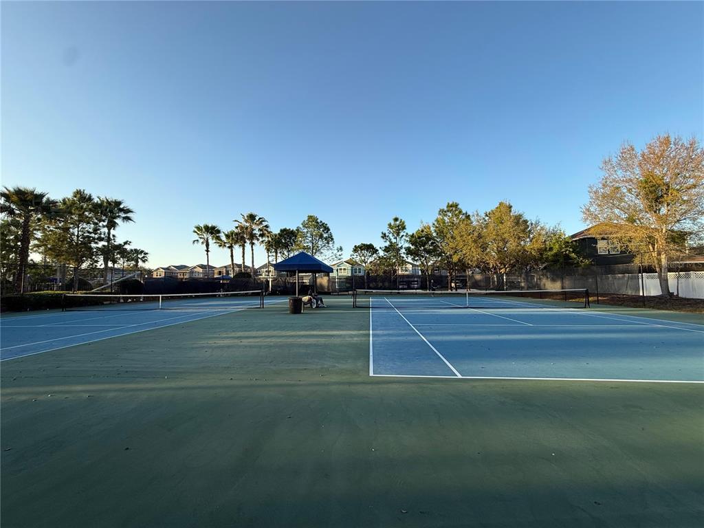 7649 Intrepid Road Wesley Chapel, FL 33545 - Photo 29 of 46 a view of tennis court
