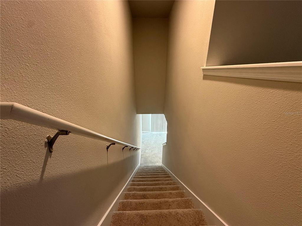 7649 Intrepid Road Wesley Chapel, FL 33545 - Photo 10 of 46 a view of balcony with wooden floor
