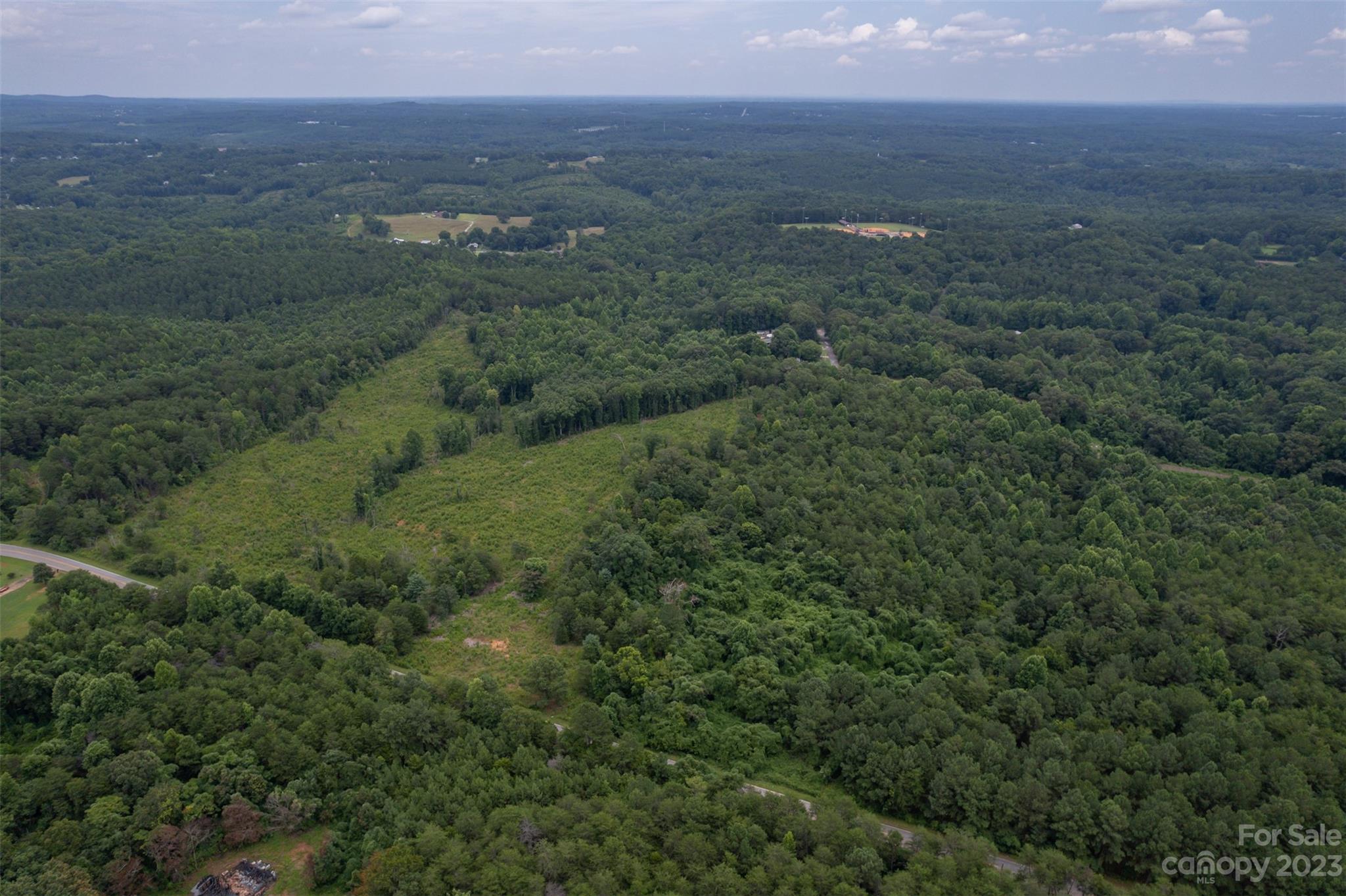 0 Horn Bottom Road Forest City, NC 28043 - Photo 16 of 22 an aerial view of residential houses with outdoor space and trees