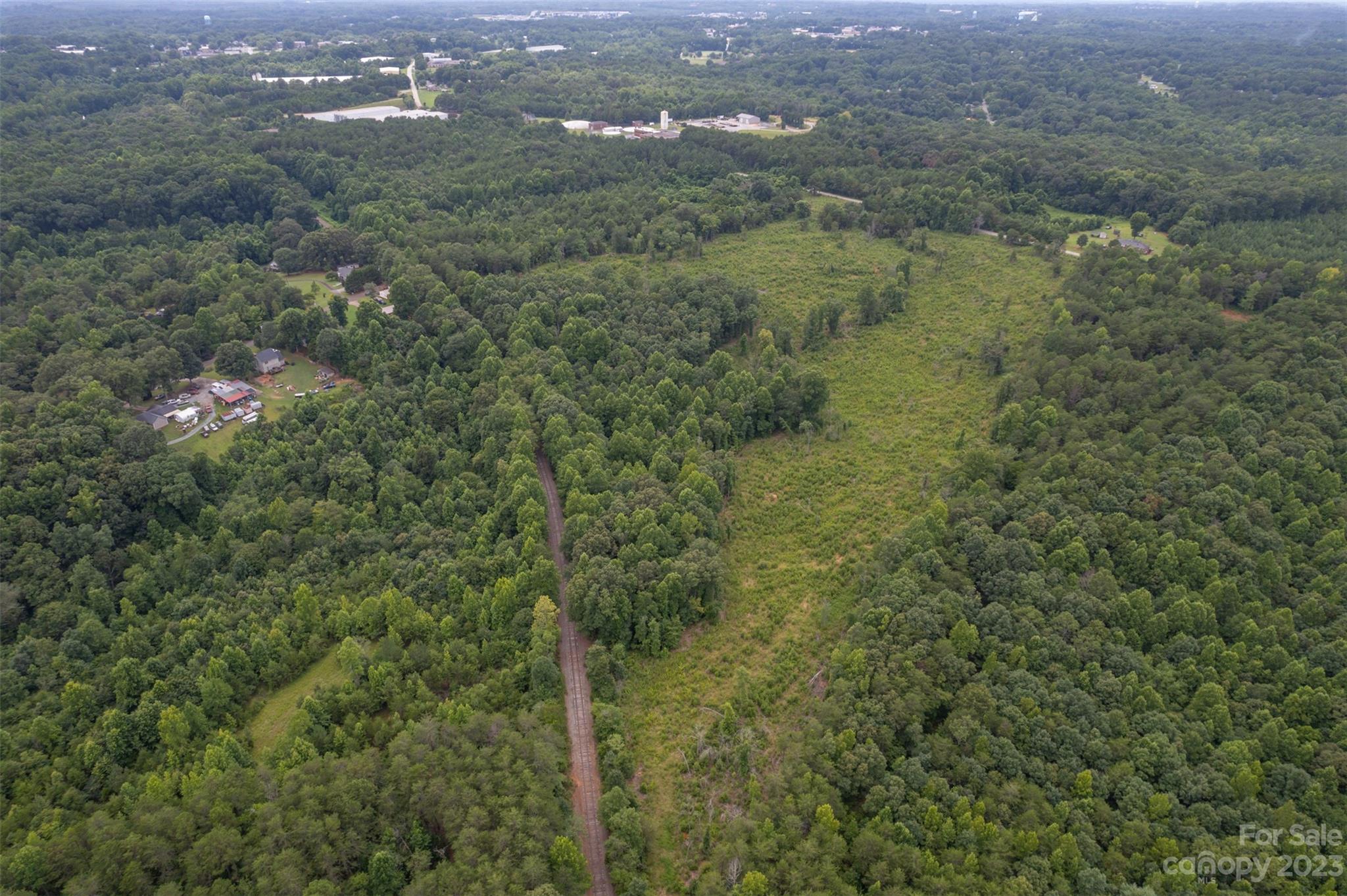 0 Horn Bottom Road Forest City, NC 28043 - Photo 21 of 22 a view of a city with lush green forest