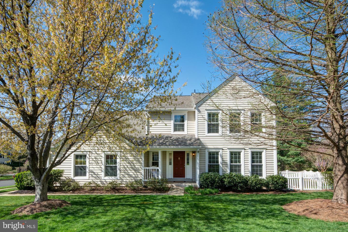 Charming curb appeal with side-load garage